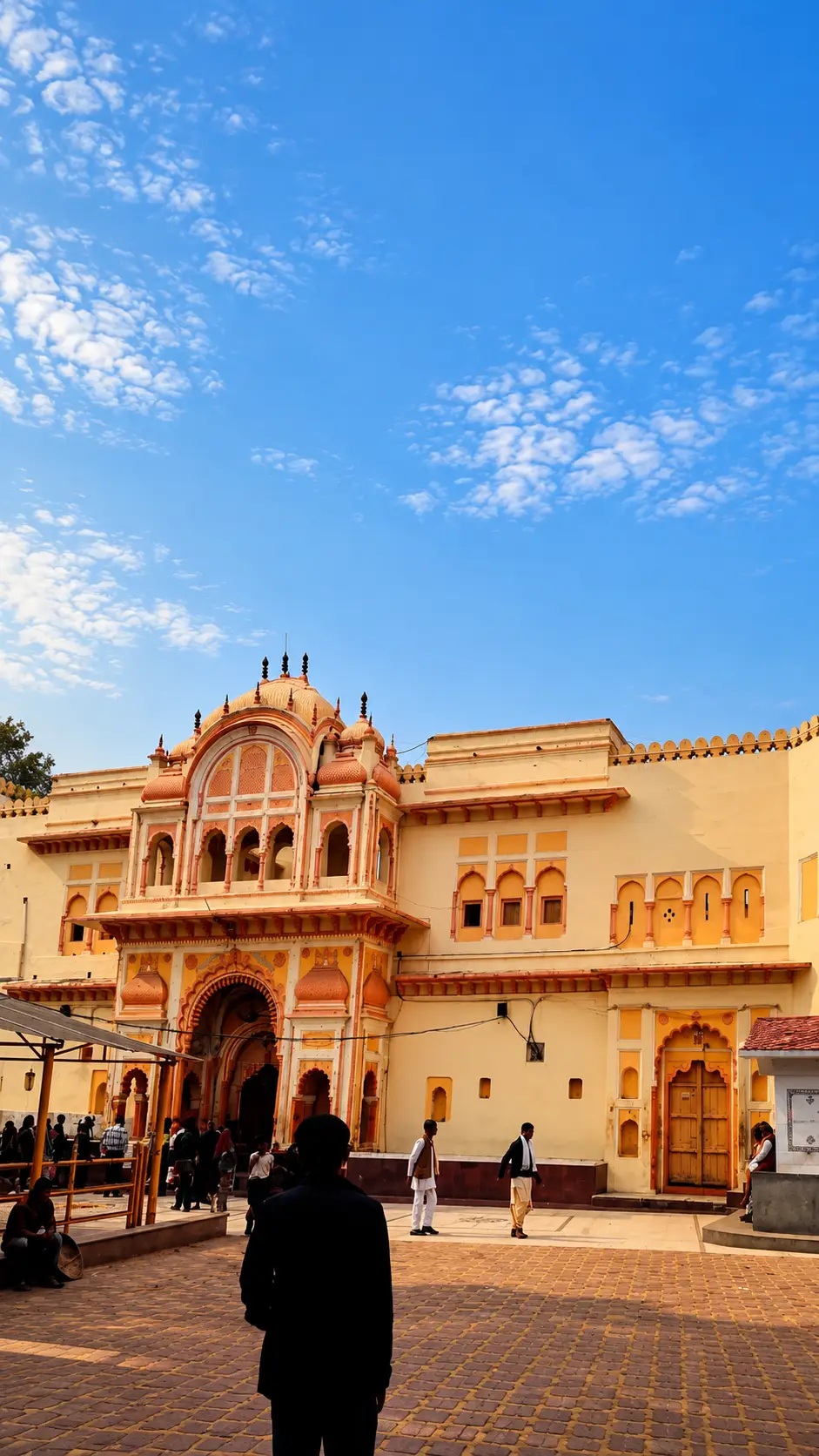Ram Raja Temple with ornate entrance and visitors in Orchha, Madhya Pradesh, India.